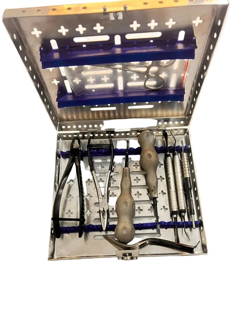 Set of tools in a metal case on a white background